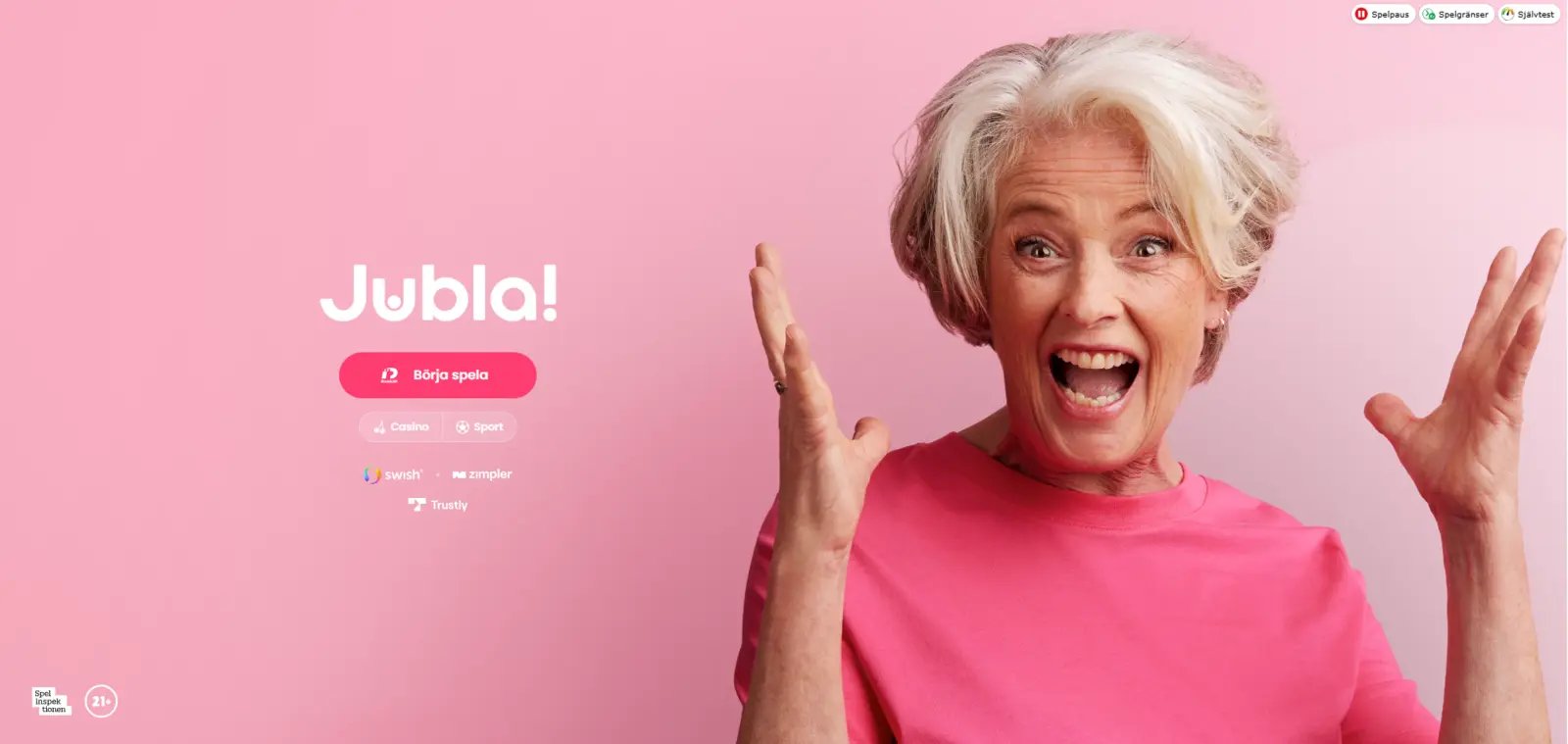 Jubla Casino startsida med cerise rosa design och cartoon-mormor som varumärkesmaskot